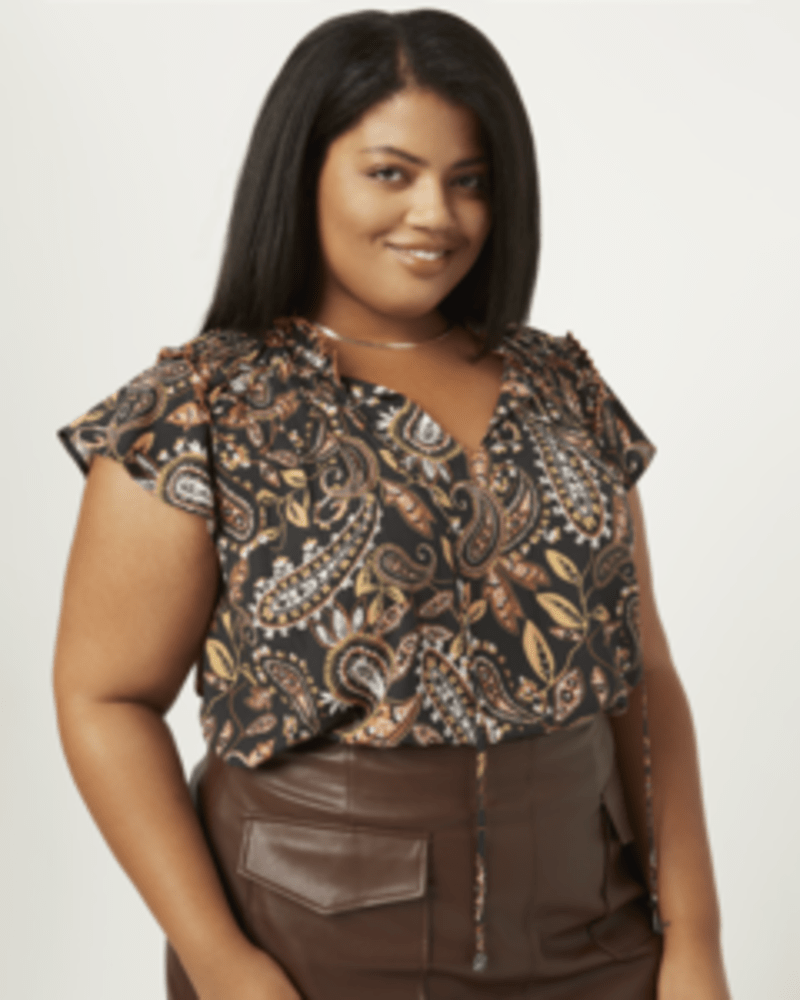 Front of a model wearing a size 0X Teresa Flutter Sleeve Tie Neck Blouse in N056 BLACK by Daniel Rainn. | dia_product_style_image_id:255316